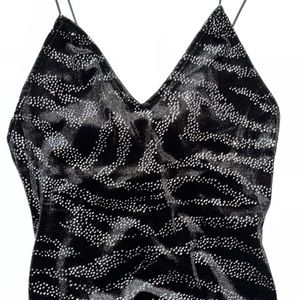 Black velvet spaghetti strapped dress